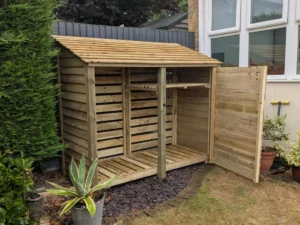 7ft deep log store with door and shelf