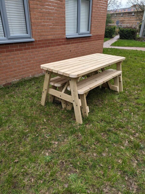 Light green 6ft wooden picnic table with rounded edges, showing a sturdy and compact design.