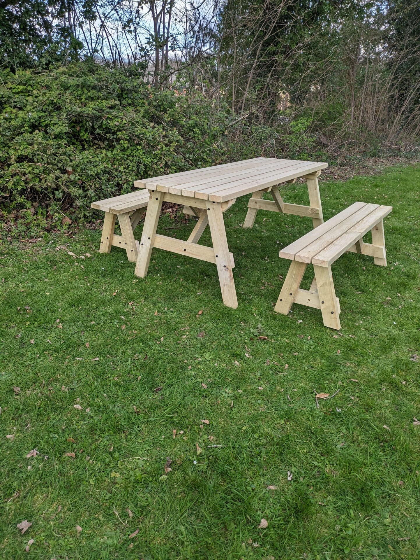 picnic table with benches, featuring two attached benches.