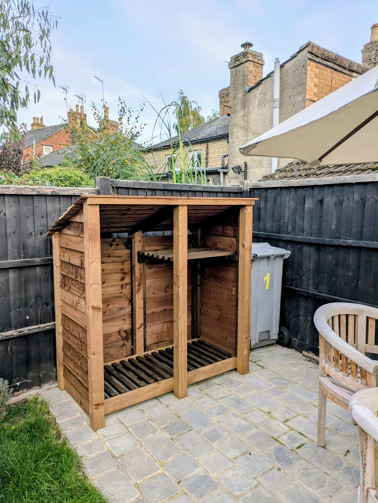 5ft log store reverse roof with one bay shelf