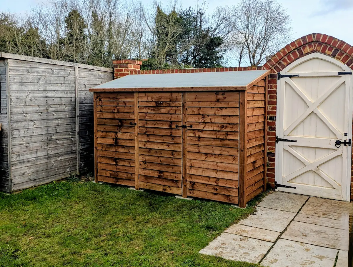 9ft deep log store with felt roof