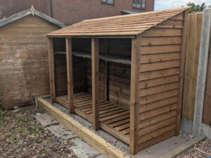9ft deep log store with shelf, side view
