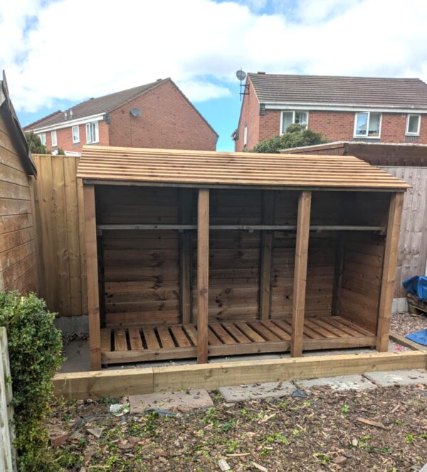 9ft deep log store Lavenham with 930mm depth, front view, triple bay wooden firewood storage with slatted base and featheredge roof.