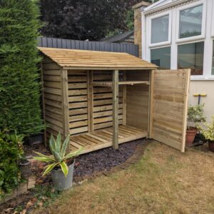 7ft deep log store with 1 bay shelf and single door – green finish