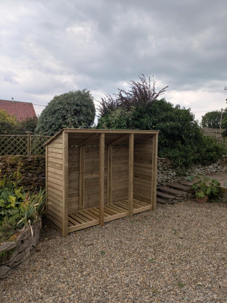 6ft log store Baylham, light green, 5ft high, one with doors, one with shelf