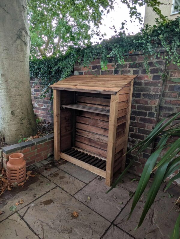 4ft compact log store with shelf in brown finish