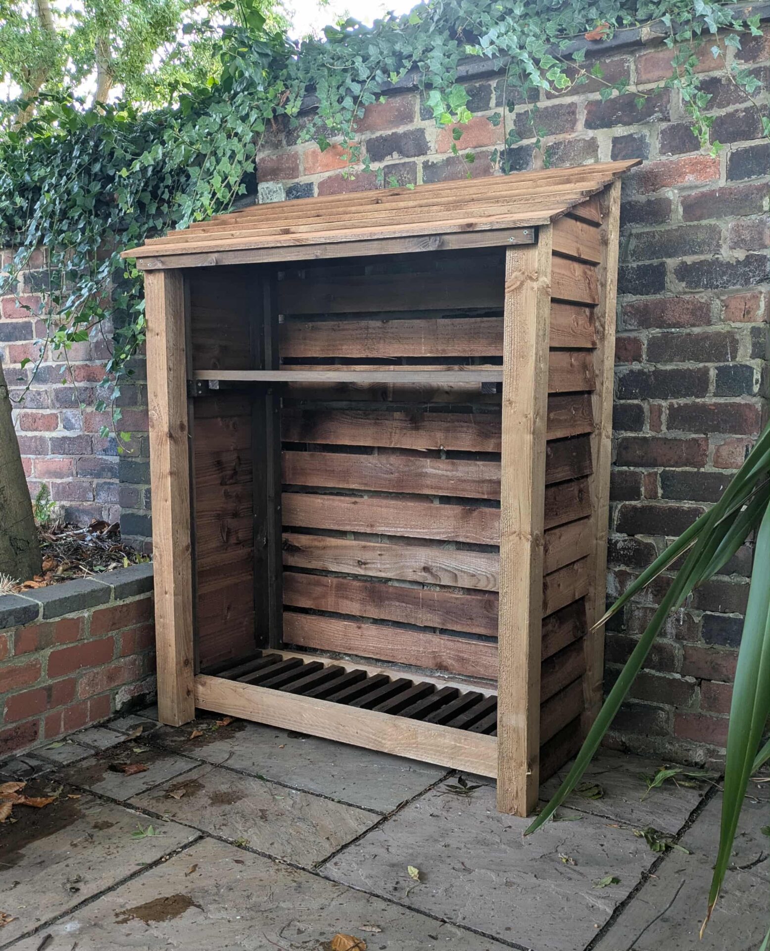 4ft compact log store with shelf front view