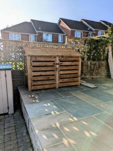 7ft log store with custom slatted doors 